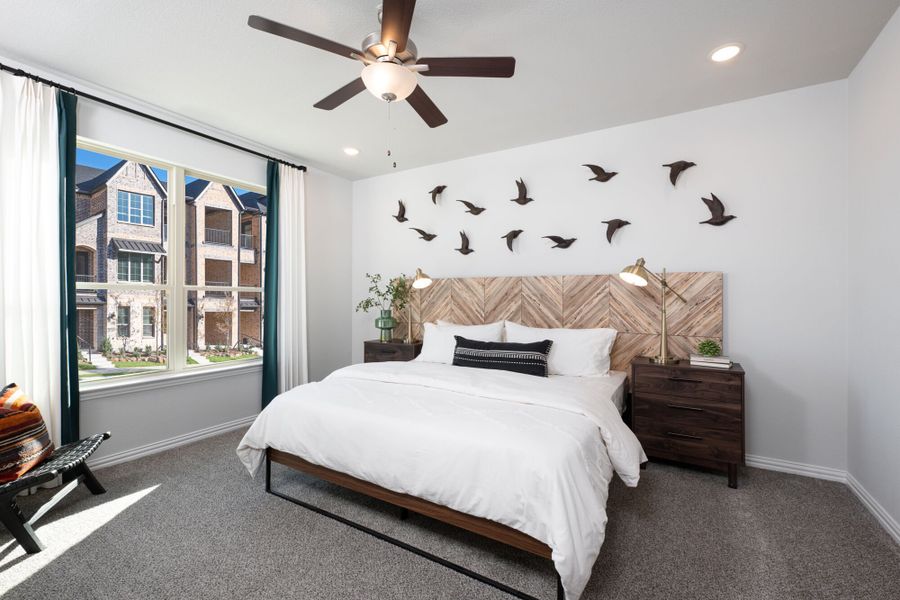 Furnished interior in a model home at Wade Settlement Townhomes in Frisco (Image 9).
