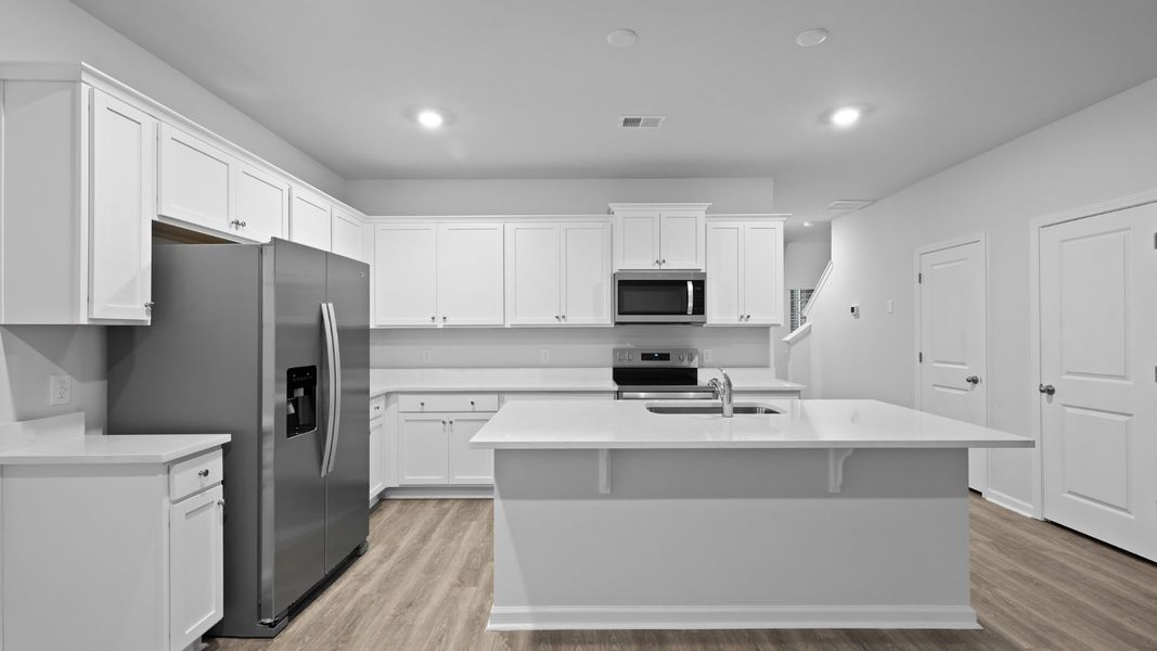 Furnished interior in a model home at Garbon Fields in Summerville (Image 6).