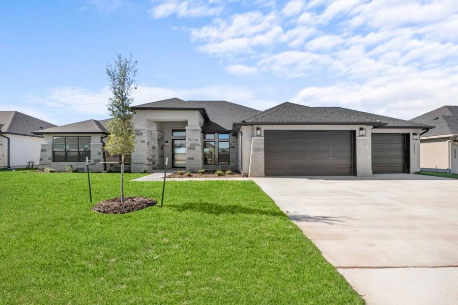 Front exterior of a home in the Bella Charca community, located in Nolanville, TX (Image 8).