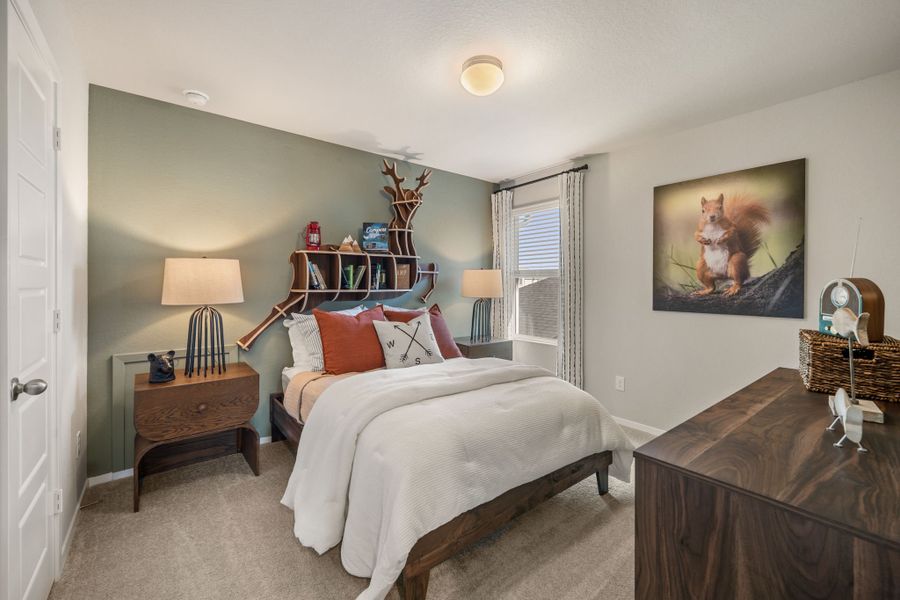 Furnished interior in a model home at Hunters Ranch in San Antonio (Image 26).