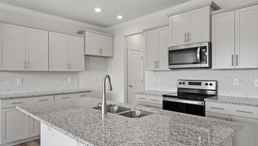 Furnished interior in a model home at Skybrook Corners in Concord (Image 5).