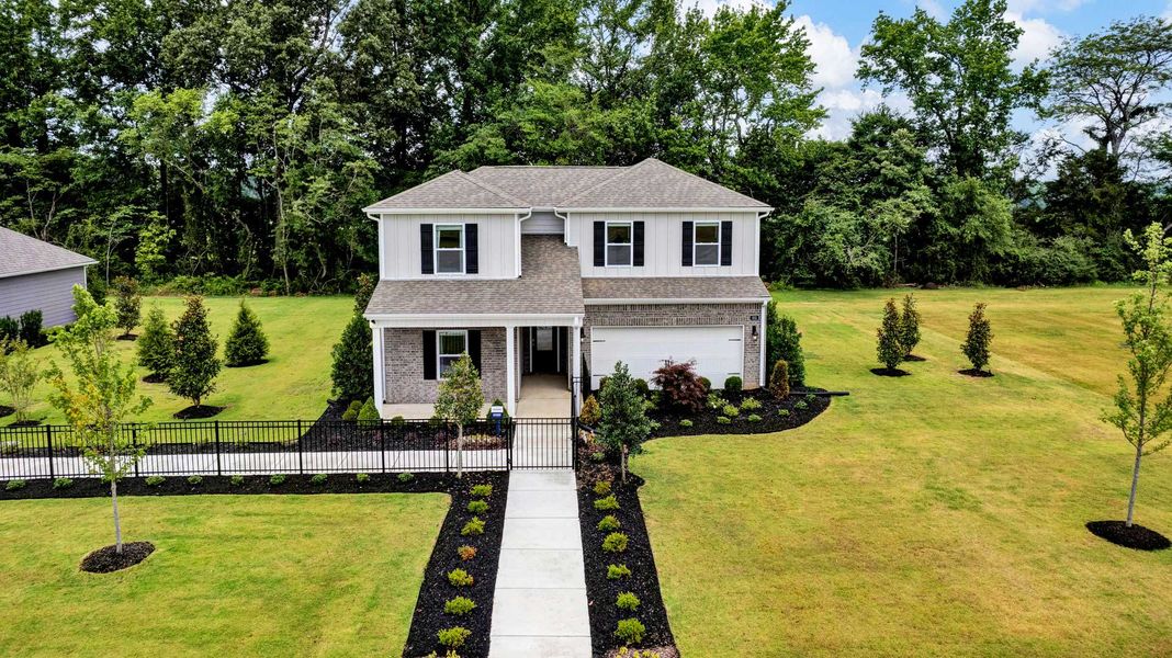 Front exterior of a home in the Riverwood Gardens community, located in Oakland, TN (Image 18).