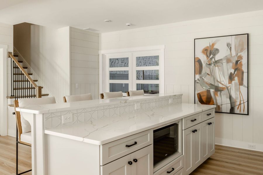 Furnished interior in a model home at Mayes Hall in Davidson (Image 60).