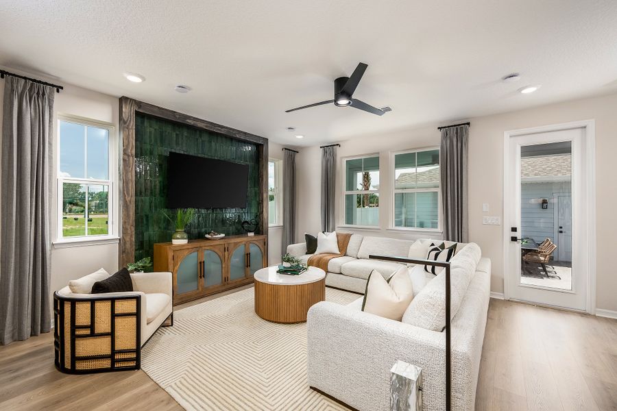Furnished interior in a model home at Aulin Square in Oviedo (Image 6).