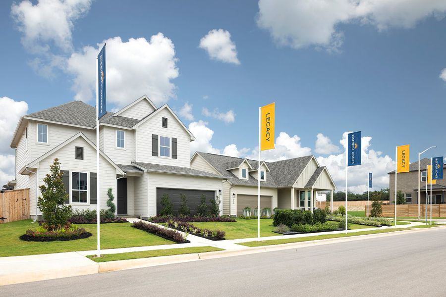 Front exterior of a home in the Legacy Collection - Freedom at Anthem community, located in Kyle, TX (Image 3). Front exterior of a home in the Legacy Collection - Freedom at Anthem community, located in Kyle, TX (Image 3).