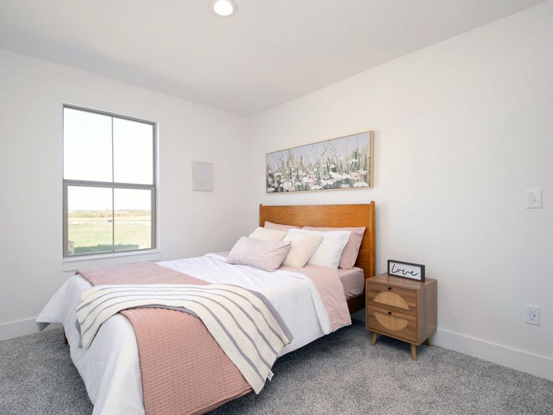 Furnished interior in a model home at Van Cleave in San Antonio (Image 10).