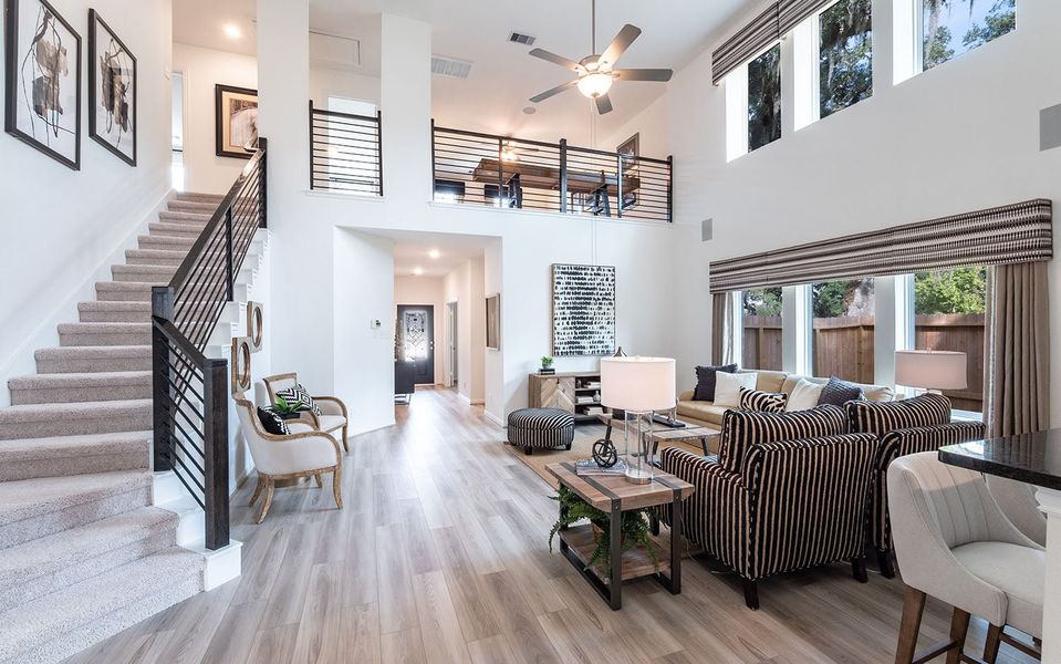 Furnished interior in a model home at Infinity Square in Kyle (Image 3).