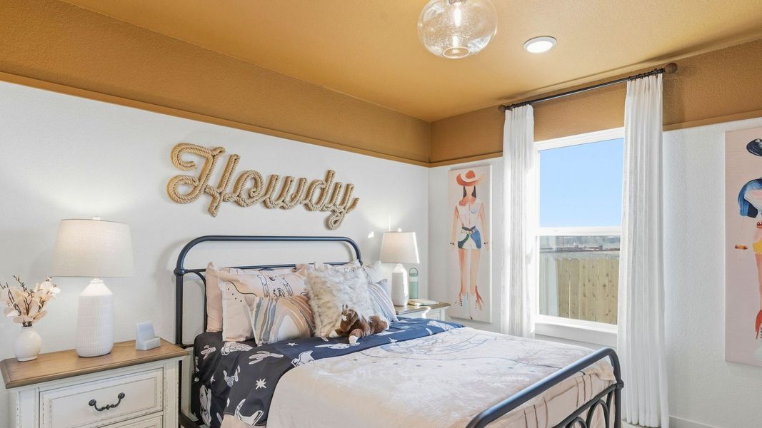 Experience elegance with this Infinity Square home featuring exquisite brickwork and a gabled roof.