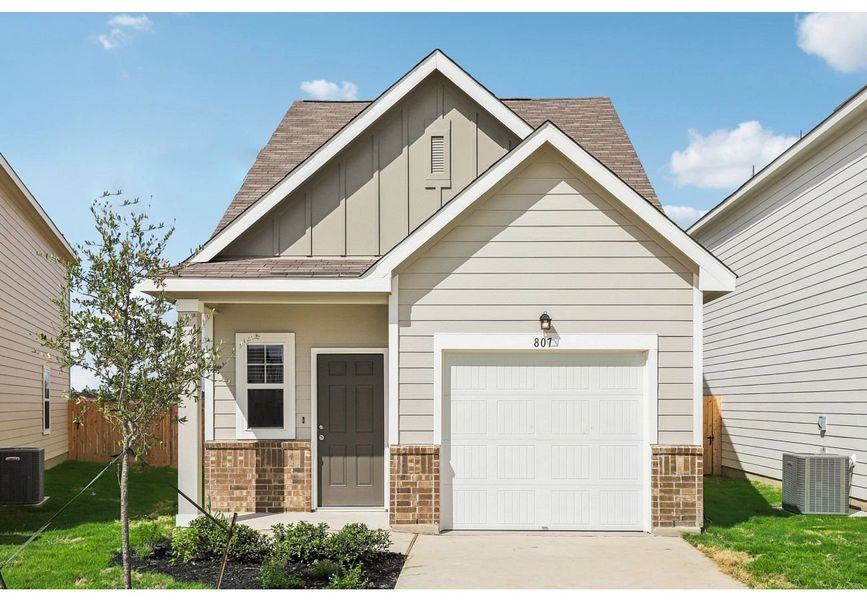 Front exterior of a home in the The Wilder community, located in Adkins, TX (Image 3).