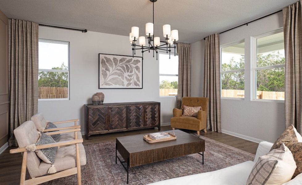 Furnished interior in a model home at Cannon Ranch 45s in Dripping Springs (Image 5).