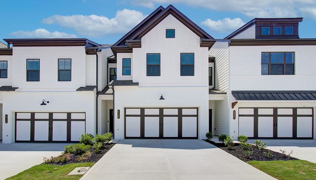 Front exterior of a home in the The Towns at Auburn Station East community, located in Auburn, GA (Image 9).