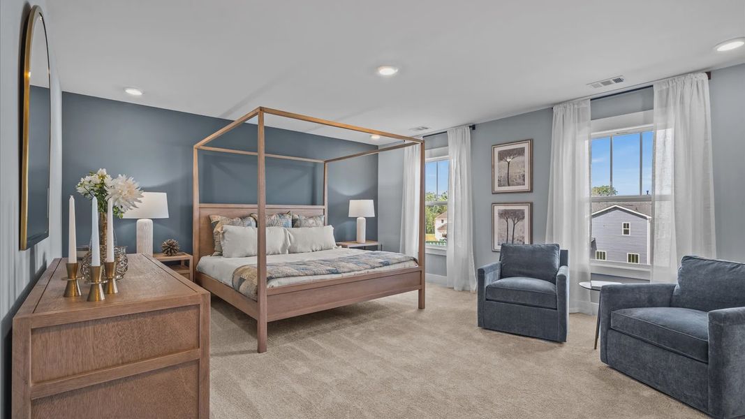 Plush carpeted, cozy, inviting primary suite with large windows at Magnolia Park by DRB Homes in Woodruff, SC Plush carpeted, cozy, inviting primary suite with large windows at Magnolia Park by DRB Homes in Woodruff, SC