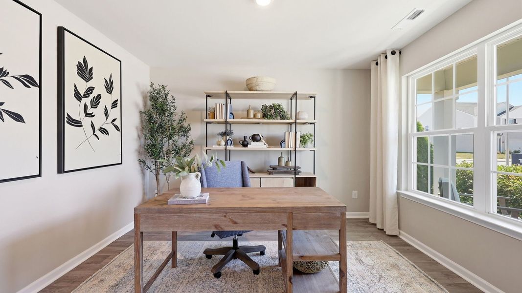 Furnished interior in a model home at Carter Ridge in Greenville (Image 6).