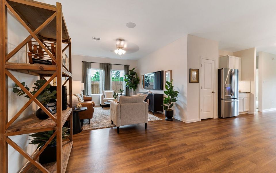 Furnished interior in a model home at The Pines at Seven Coves in Willis (Image 5).