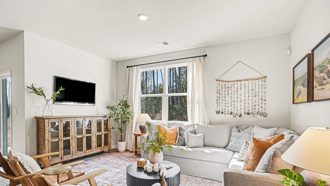 Furnished interior in a model home at Winfield Farms in Myrtle Beach (Image 7).