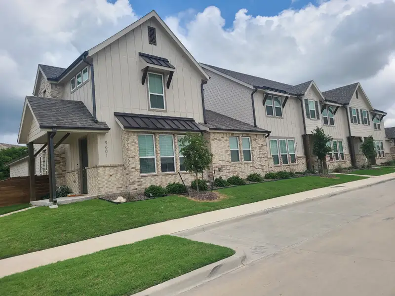 Charming townhomes with modern exteriors and landscaped yards in Lake Parc Village Townhomes by Veralux Homes (Fort Worth, TX). Charming townhomes with modern exteriors and landscaped yards in Lake Parc Village Townhomes by Veralux Homes (Fort Worth, TX).