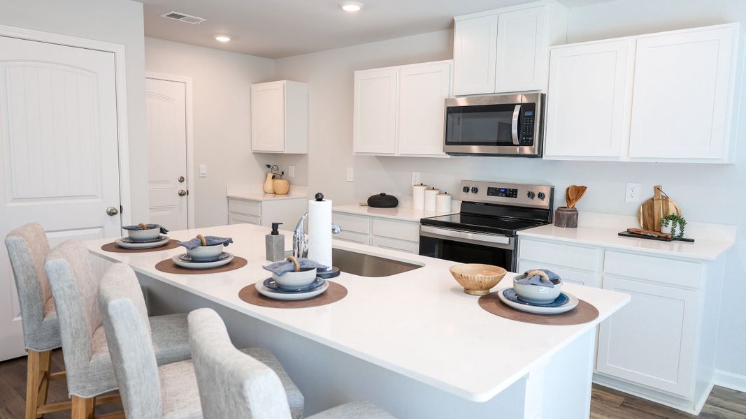 Furnished interior in a model home at Paddington Place in Baxter (Image 7).