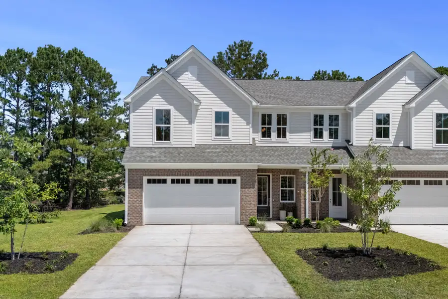 Front exterior of a home in the Long Bay Golf Club community, located in Longs, SC (Image 10).