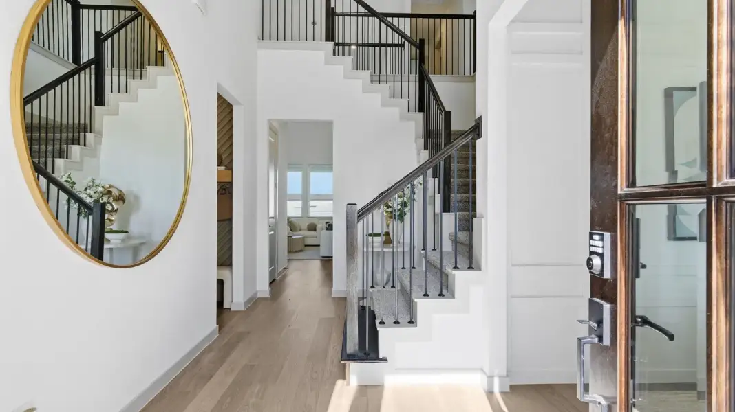 Furnished interior in a model home at Alexander 65' Homesites in Pearland (Image 35).
