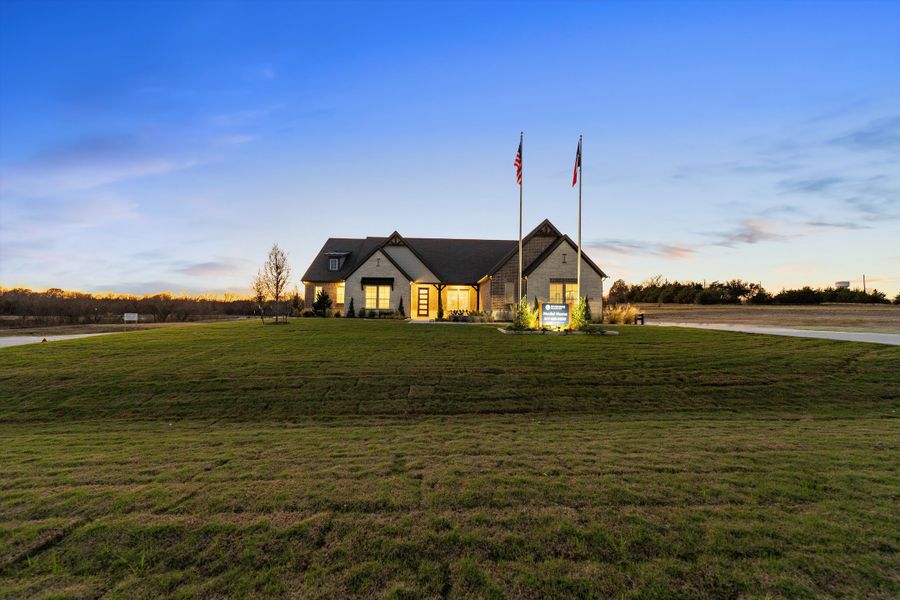 Front exterior of a home in the Grayson Ridge community, located in Van Alstyne, TX (Image 26).