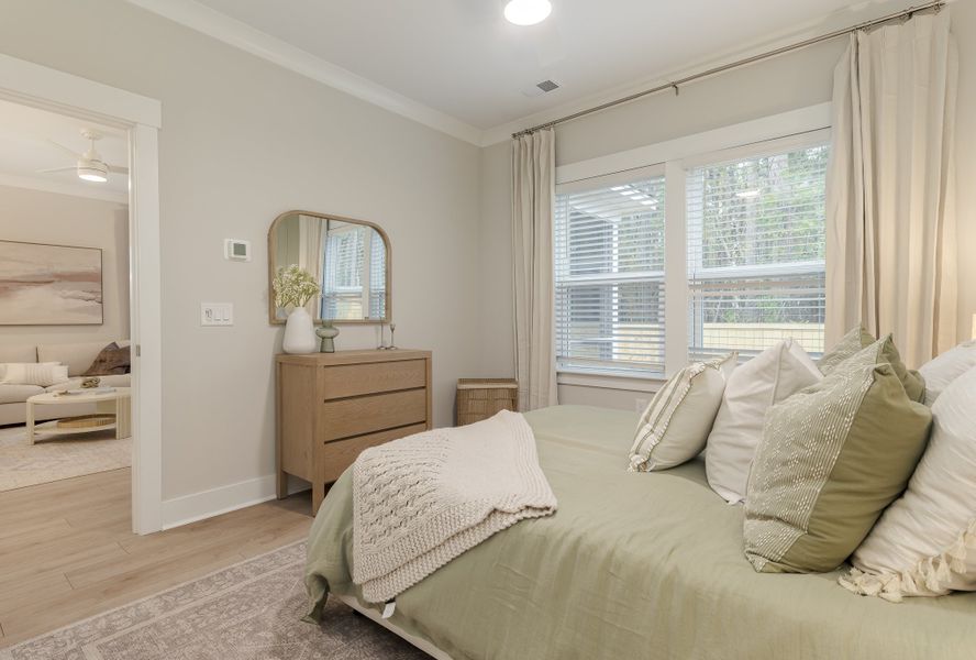 Furnished interior in a model home at Founder's Park in Summerville (Image 5).