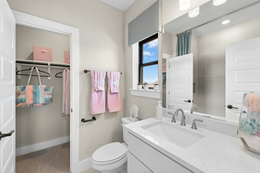 Furnished interior in a model home at Caliterra in Dripping Springs (Image 65).