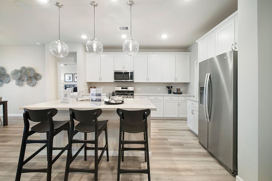 Furnished interior in a model home at Sunterra: Founders in Katy (Image 2).