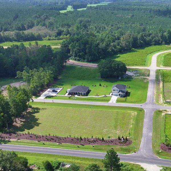 Aerial view of the Elyse Meadows community in Lillington, NC, showing layout and nearby surroundings (Image 1).