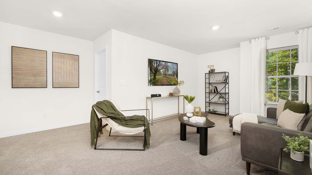 Furnished interior in a model home at Reedy Creek Preserve in Charlotte (Image 23).
