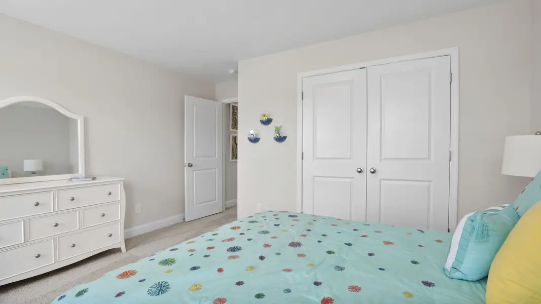 Furnished interior in a model home at Blue Ridge Trail in Fountain Inn (Image 18).