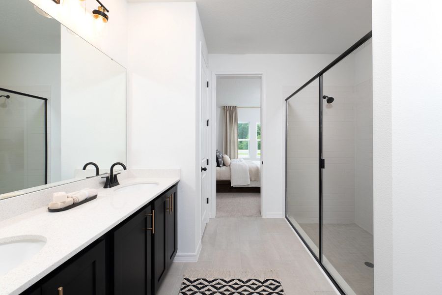 Furnished interior in a model home at Hawks Run in Kissimmee (Image 4).