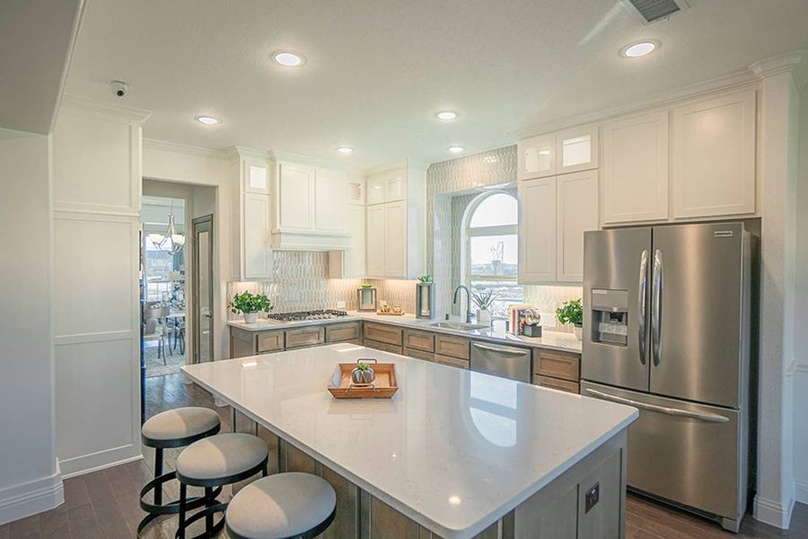 Furnished interior in a model home at Woodcreek in Fate (Image 8).