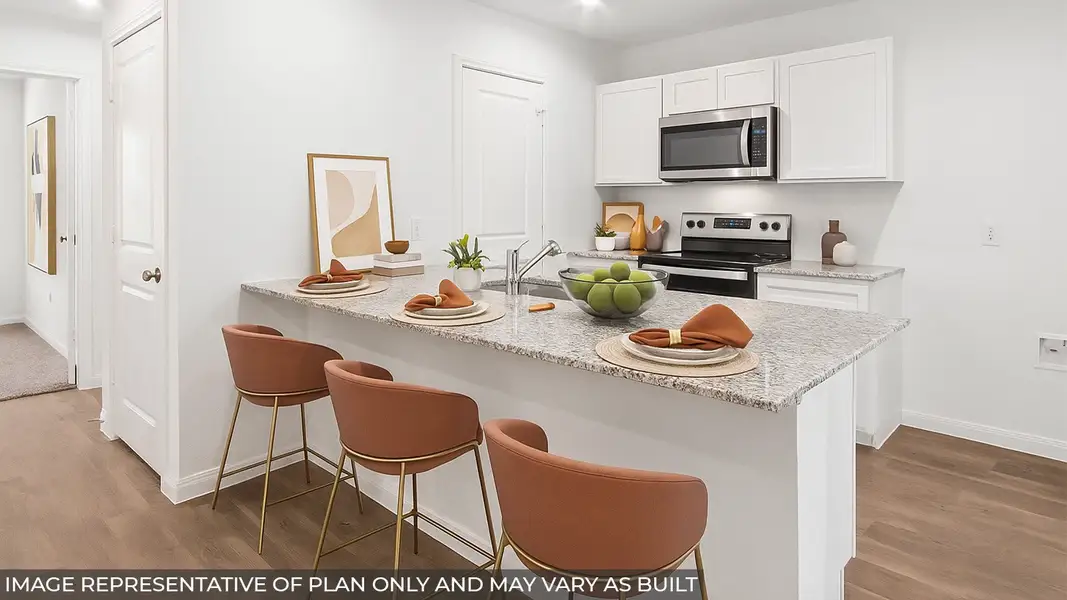 Furnished interior in a model home at Baron Village in Conroe (Image 6).