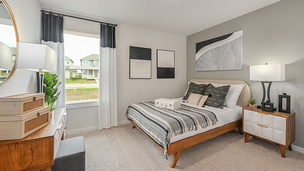 Furnished interior in a model home at Midtown Reserve in College Station (Image 13).