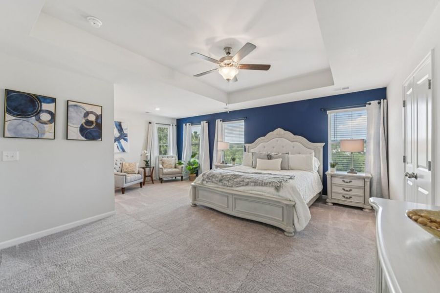 Furnished interior in a model home at The Hills at Cedar Creek in Winder (Image 60).