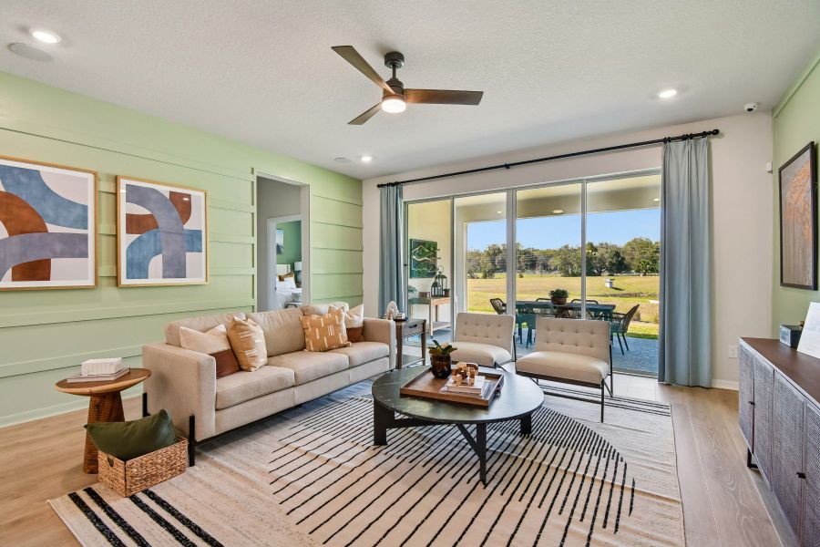 Furnished interior in a model home at Oakfield at Mount Dora Cottage Series in Mount Dora (Image 21).