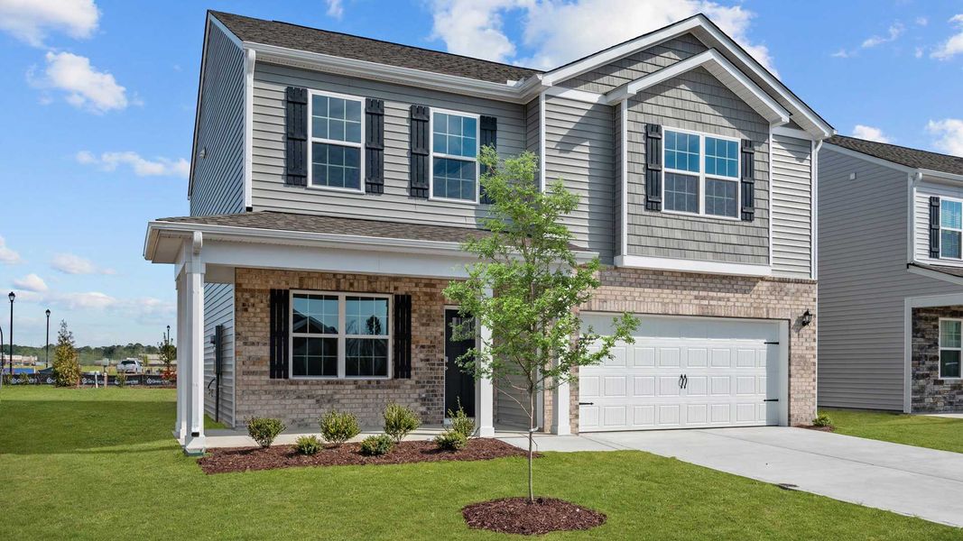 Front exterior of a home in the Ridgewood Farms community, located in Winterville, NC (Image 12).