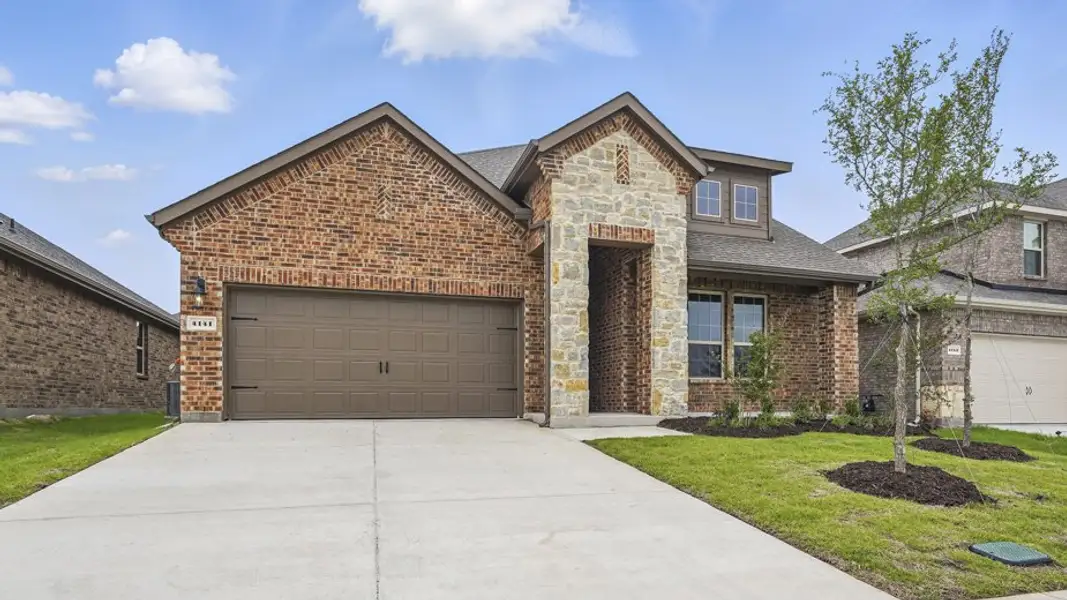 Front exterior of a home in the Lakewood Trails community, located in Forney, TX (Image 1).