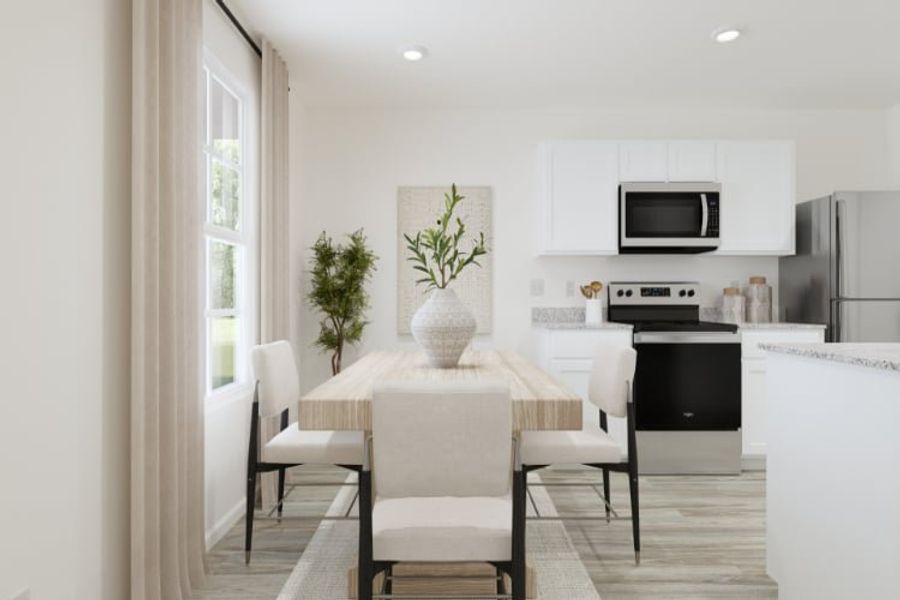 A kitchen with a dining table and chairs. A kitchen with a dining table and chairs.