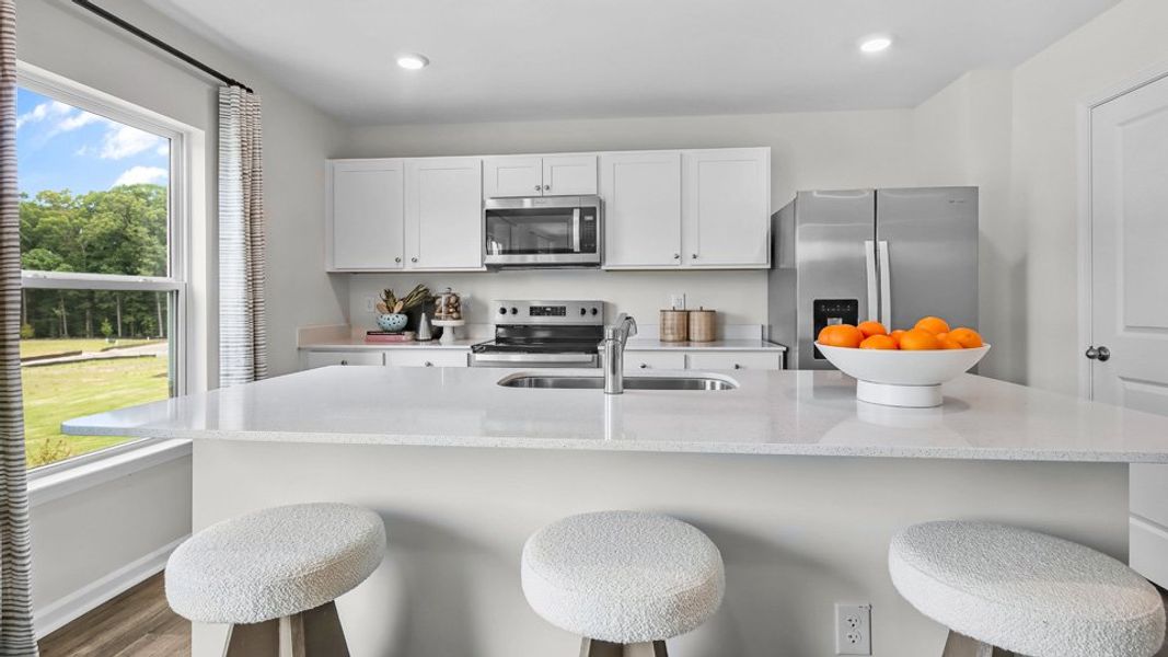 Furnished interior in a model home at Lawson Glen in Clayton (Image 7).