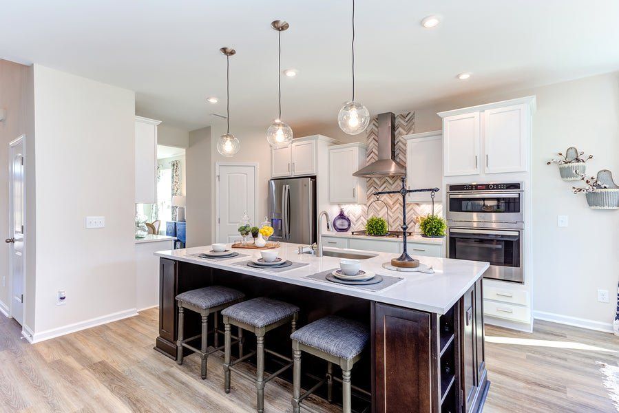 Furnished interior in a model home at The Farm at Neill's Creek in Lillington (Image 5).