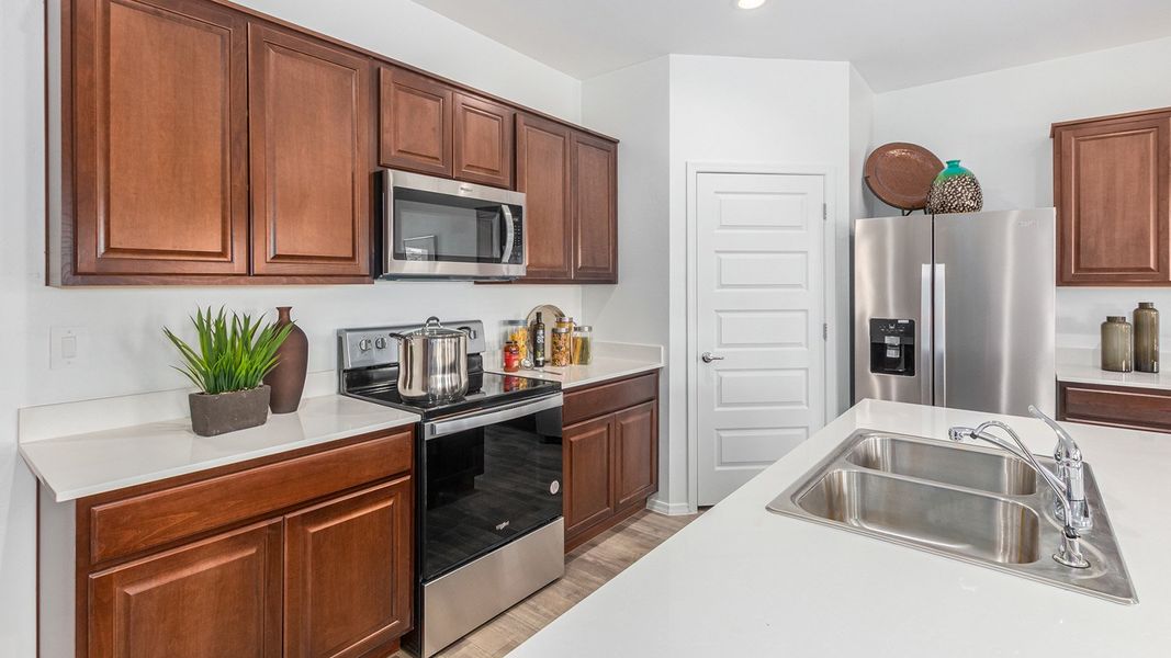Furnished interior in a model home at Roadrunner Estates in Tucson (Image 21).