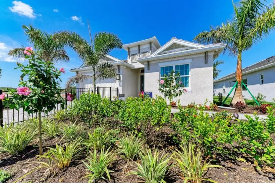 Front exterior of a home in the Inspiration at Watercolor Place community, located in Bradenton, FL (Image 4). Front exterior of a home in the Inspiration at Watercolor Place community, located in Bradenton, FL (Image 4).