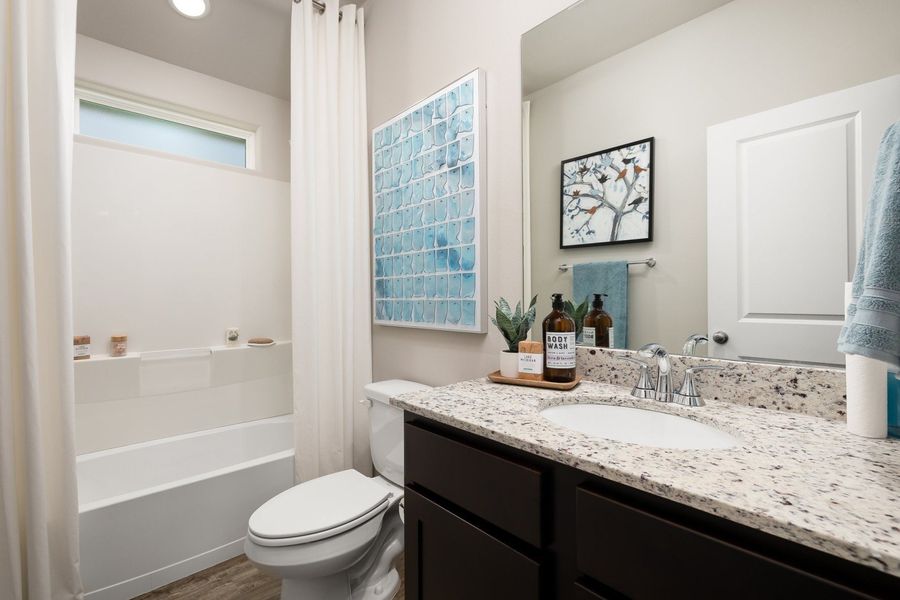 Furnished interior in a model home at Alberta Heights in Edinburg (Image 65).