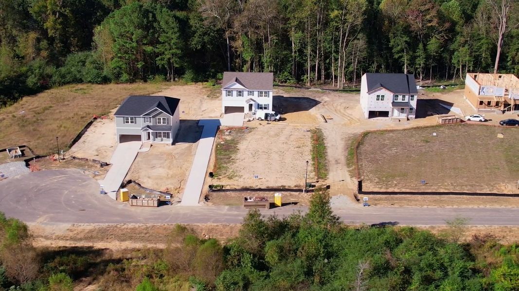Aerial view of the Leander Lee Preserve community in Lillington, NC, showing layout and nearby surroundings (Image 1). Aerial view of the Leander Lee Preserve community in Lillington, NC, showing layout and nearby surroundings (Image 1).