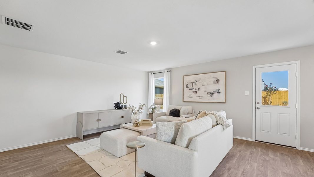 Furnished interior in a model home at Marigold in Kyle (Image 16).