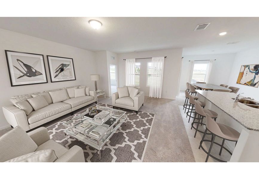 Furnished interior in a model home at Sunset Hills in Winter Haven (Image 4).