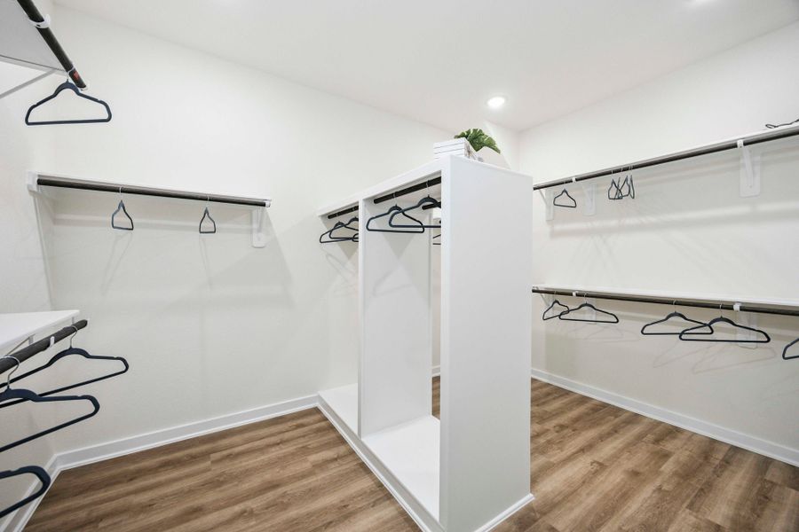 Blue Heron Estates Model Home - Arlington Floorplan - Primary Closet Blue Heron Estates Model Home - Arlington Floorplan - Primary Closet