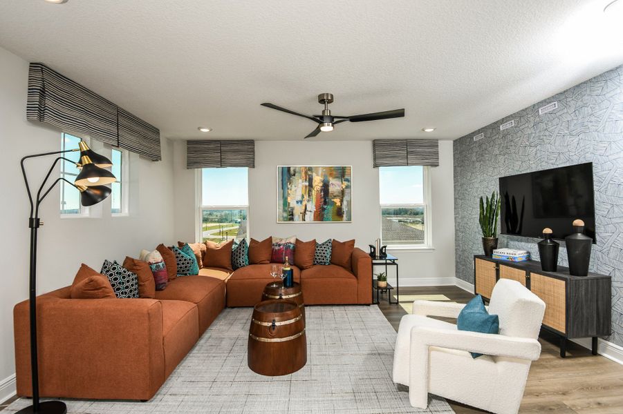 Furnished interior in a model home at Vintner Reserve in Clermont (Image 9).