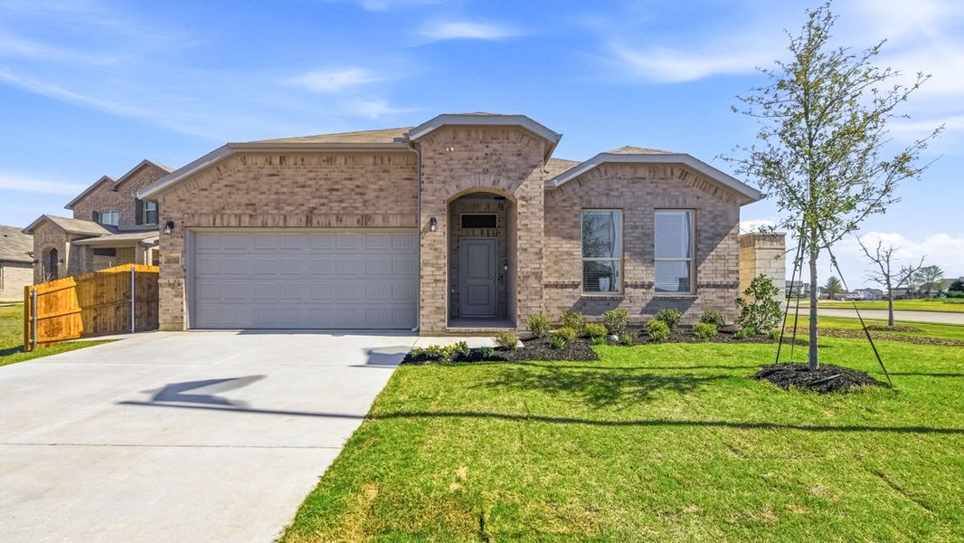 Front exterior of a home in the Trails of Elizabeth Creek community, located in Fort Worth, TX (Image 6).